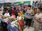 Kapolres Magetan Ajak Puluhan Anak Yatim Piatu Belanja Baju Lebaran