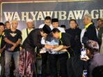 Pemberian santunan kepada masyarakat.