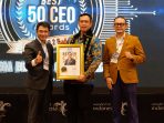 Direktur Utama Perum Bulog Ahmad Rizal Ramdhani (tengah) meraih penghargaan bergengsi "Indonesia Best 50 CEO Awards 2026" kategori Most Popular yang diselenggarakan oleh The Iconomics.