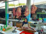 Pedagang daging di Pasar Bangil. (Foto: Zia Ulhaq) Pedagang daging di Pasar Bangil. (Foto: Zia Ulhaq)