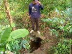 Retakan tanah yang menganga di atas area makam argojali Ngetos, BPBD Nganjuk meminta warga waspada (ist)