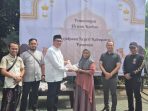 Ruatandi Gustawirya, Kajari Kabupaten Pasuruan serahkan daging kurban.