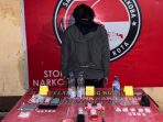 Tersangka diamankan di Polres Bima Kota.