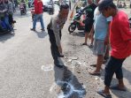 Petugas saat olah TKP. (Foto: Ist)