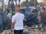 Kondisi pagar Sekretariat PWI Jember yang ditabrak oleh minibus. (Foto: Aji)