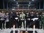 Kapolres Gresik AKBP Ramadhan Nasution saat menghadiri pengesahan warga baru PSHT dan Suroan Agung.
