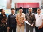IMG-20260603-WA0001 Anggota Gerindra usai laporan di Polres Pasuruan.