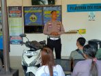 Anggota Satlantas sosialisasi kepada wajib pajak.