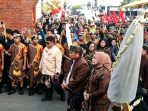 Prosesi ritual Kirab Boyong dan Sedekah Bumi Hambangun Projo 2026 yang digelar Pemkab Nganjuk.(Agus Karyono)
