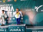 Mahendra Mandala Putra Kusuma peraih medali emas internasional turut mengantar Taekwondo Nganjuk raih Juara Umum.