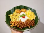 Tampilan bubur suro yang gurih siap dihidangkan sekaligus diantar ke tetangga sekitar