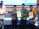 IMG-20260617-WA0003 Pemkab Mojokerto menyerahkan hibah aset berupa tanah dan bangunan kepada Kemenag dan Kemenhaj.(istimewa)