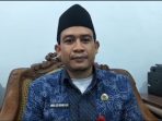 Wakil Kepala Sekolah Bidang Hubungan Masyarakat (Waka Humas) SMA Budi Utomo Gadingmangu, Abdul Aziz Kusaini saat diwawancara. (teguh)