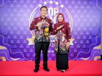 Bupati Bojonegoro, Setyo Wahono, menerima penghargaan Best Regional Leaders Award 2026 for Economic Development and Financial Inclusion.