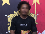 Tersangka AJLG alias Kribo.