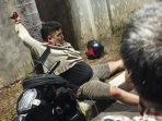 Pelaku berinisial AMD alias Sinyo saat diamankan warga di kawasan SPBU Candi usai dipancing melalui transaksi COD. (Foto: Ist)