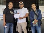 Ormas usai laporan SPKT Polres Pasuruan.