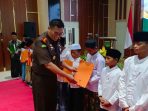 Pengangkatan wali dilakukan secara simbolis di Aula Mpu Sendok, Kompleks Perkantoran Raci, Kabupaten Pasuruan