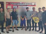 Tersangka diamankan polisi Tersangka diamankan polisi