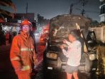 Kondisi mobil yang terbakar. Kondisi mobil yang terbakar.