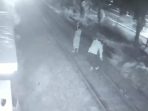 CCTV yang menunjukkan aksi heroik penjaga palang pintu kereta api