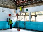 Proyek revitalisasi dari Kemendikdasmen untuk membenahi sarana dan prasarana belajar mengajar di SMA Negeri 1 Loceret (Agus Karyono)