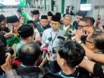 Pimpinan Sidang Komisi Organisasi Prof Asrorun Niam saat memberikan keterangan.(istimewa)