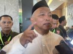 Ketua PCNU Jombang KH Fahmi Amrullah saat menyampaikan instruksi menyukseskan Muktamar ke-35 NU. (Foto: Teguh)