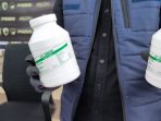 Wadah vitamin ternak yang dipakai tersangka jualan pil LL.