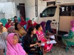 IMG-20260814-WA0008 Warga saat melakukan pembayaran PBB melalui program Mampir RW di Dusun Gedang Keret. (teguh)