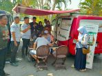 IMG-20260815-WA0001 Antrean warga bayar pajak daerah.