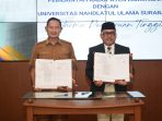 Bupati Lamongan Yuhronur Efendi bersama Rektor Unusa Tri Yogi Yuwono menandatangani MoU. (Foto: Ist)