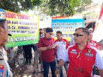 Aksi demo proyek pembangunan Barak Polres Pasuruan Kota.