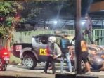 Mobil dinas Polres Pasuruan sebelum dibakar.