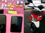 Sejumlah barang bukti dari dua terduga pengedar narkotika berinisial SI (38) dan AR (31) diamankan Satresnarkoba Polres Nganjuk